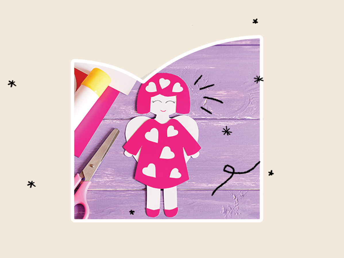 Materiais de artesanato com recorte de boneca de papel em fundo roxo.