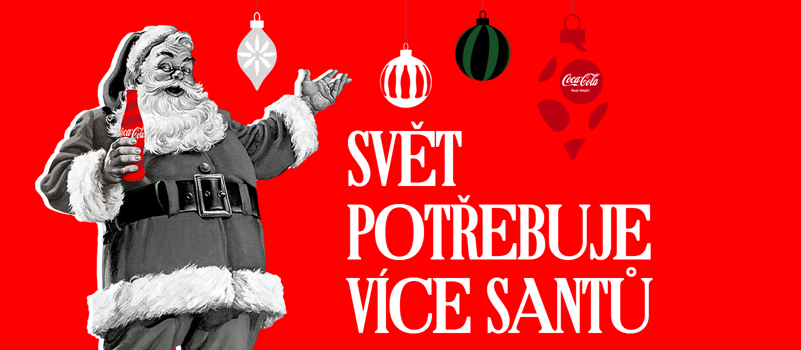 Santa Claus drží láhev Coca-Cola