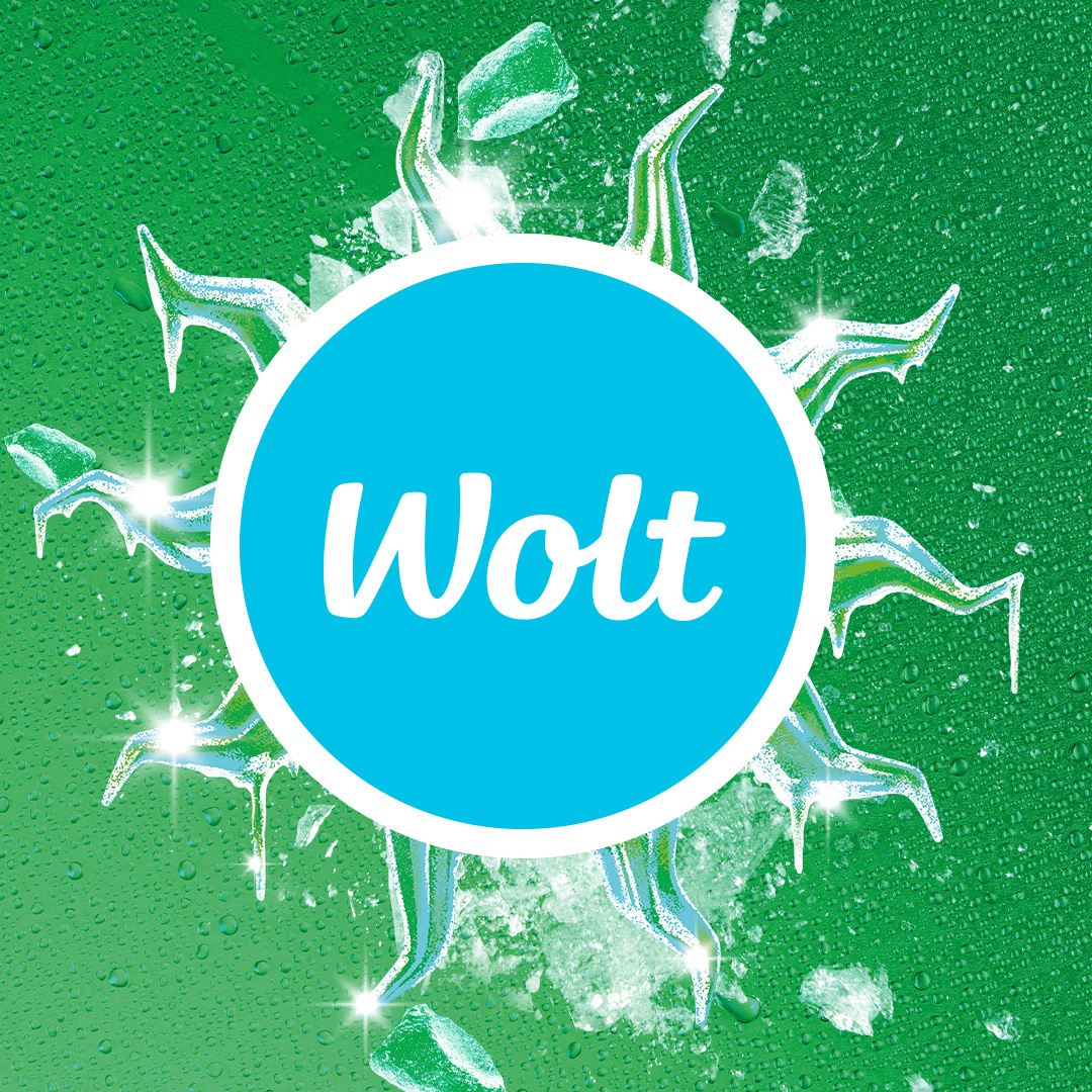 Wolt logo rohelisel taustal, ümber sähvivad efektid.