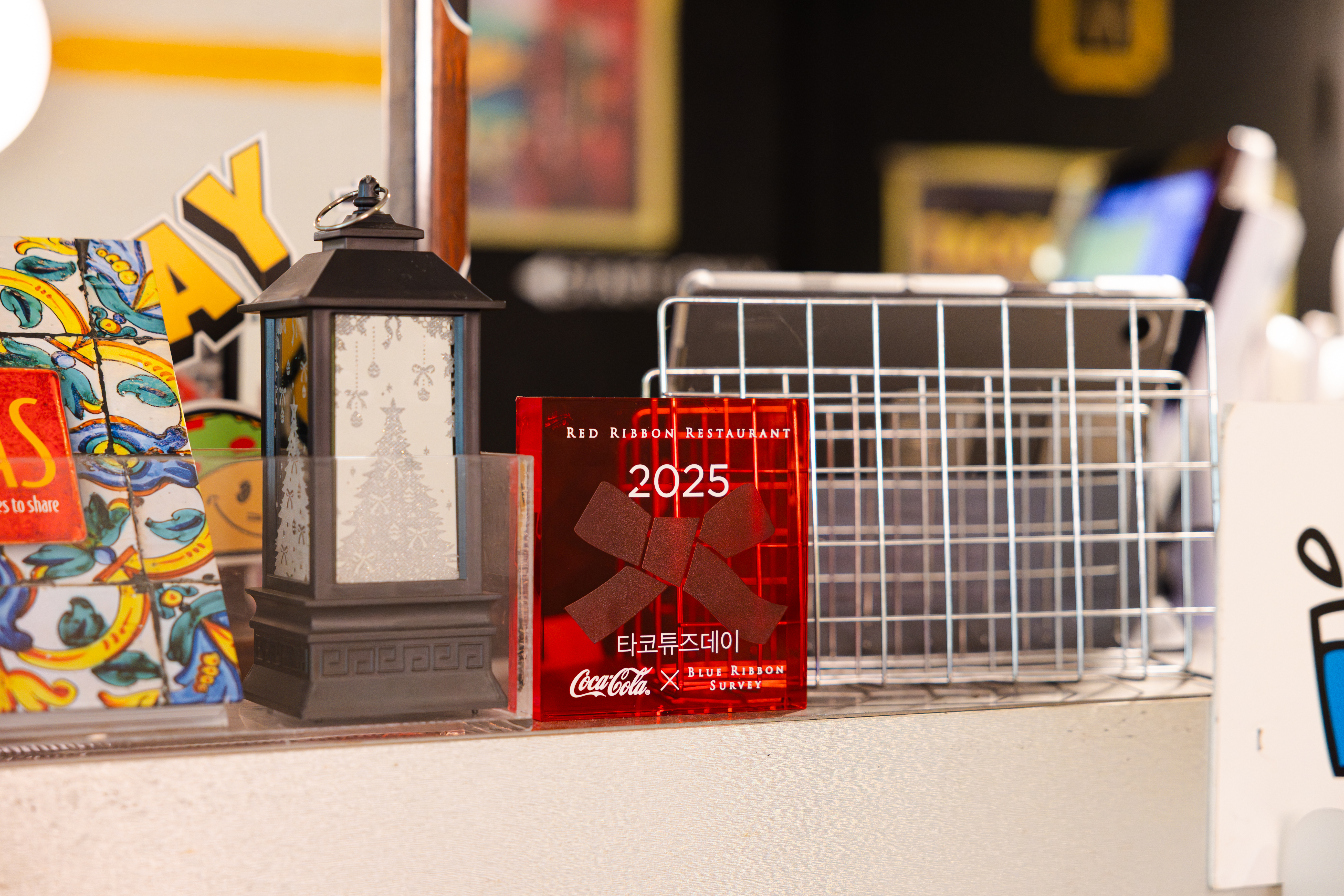 레드리본 맛집 인증을 받은 '타코튜즈데이'의 2025 레드리본 명패
