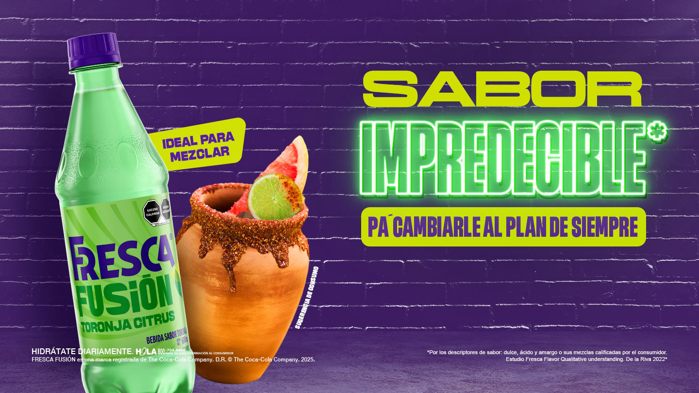 Botella de Fresca sobre fondo de ladrillos color violeta.