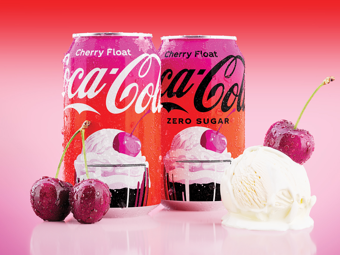Two Coca-Cola Cherry Float cans with ice cream and cherries