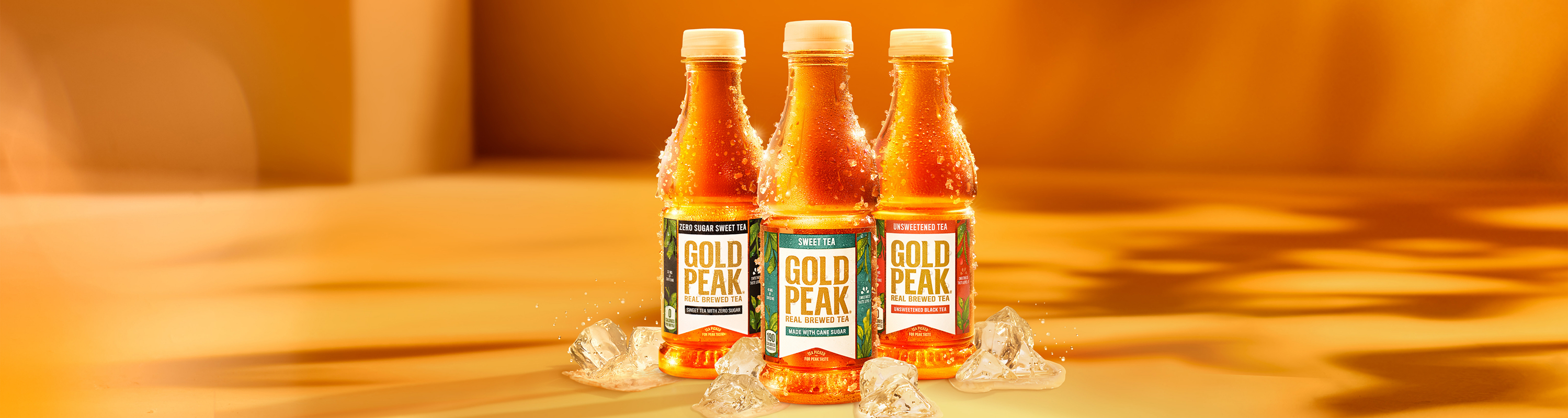 three gold peak bottles